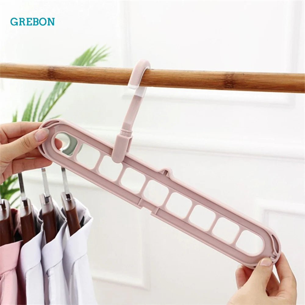 Colgador de ropa plegable giratorio